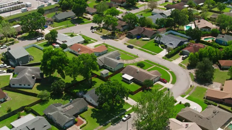 Aerial view of a Central Florida residential neighborhood, emphasizing the need for effective pest control services.