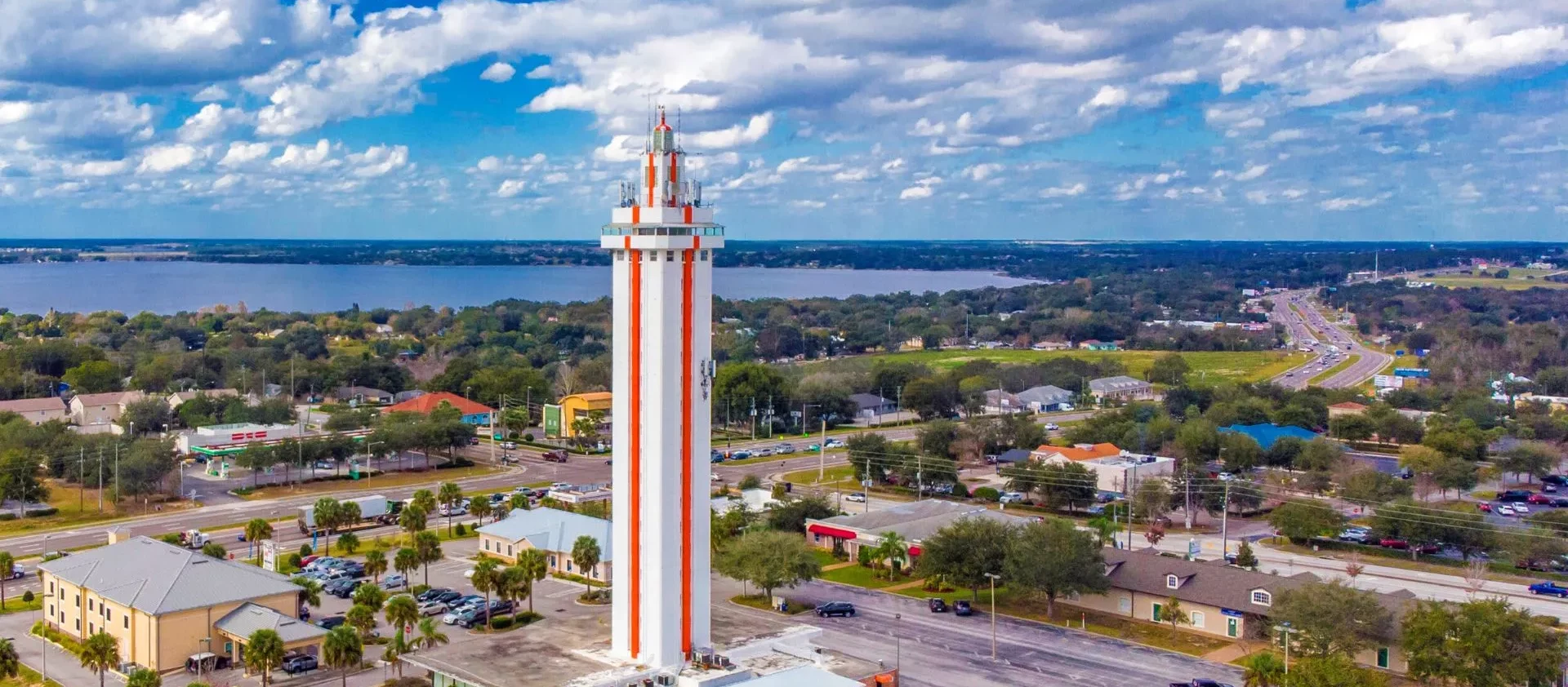 Aerial view of Clermont, Florida, highlighting the Citrus Tower and surrounding areas, promoting the pest and lawn care services provided by Termite Lawn and Pest.