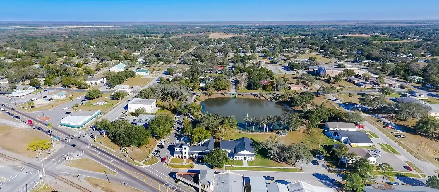 Aerial view of Davenport showing residential and commercial areas, representing the extensive pest and lawn care services provided by Termite Lawn and Pest in Davenport.