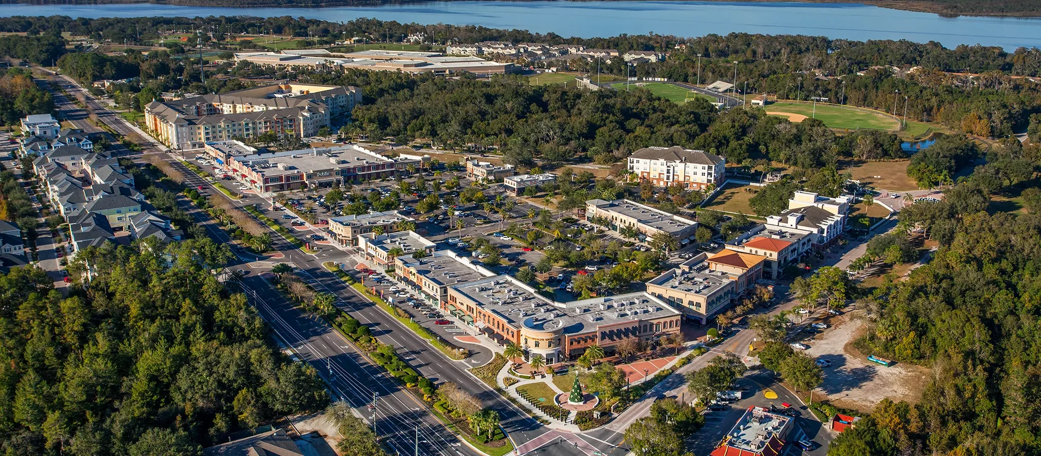 Aerial view of the Winter Springs community, highlighting the comprehensive property services available to enhance and maintain lawns and outdoor spaces.